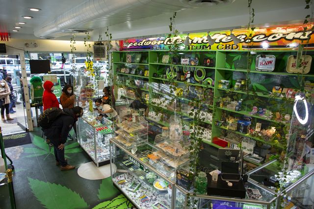 People visit the Weed World store, on March 31st, 2021, in Midtown Manhattan.